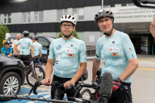 Two cyclists in sportswear – a professor and his patient